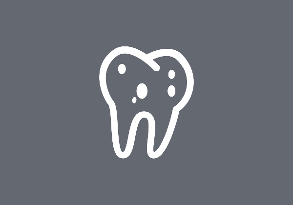 A teeth with cavity icon