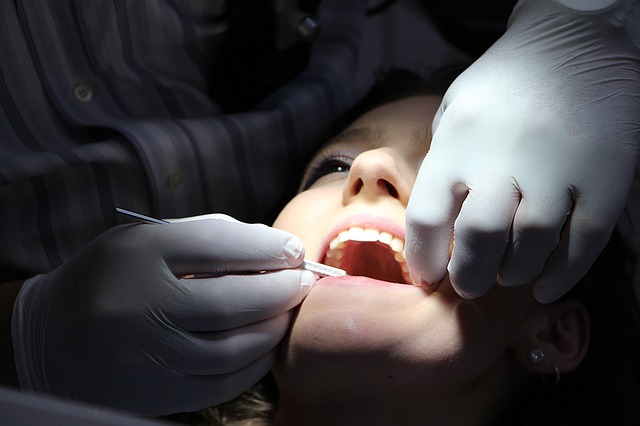 A patient undergoing a wisdom teeth extraction